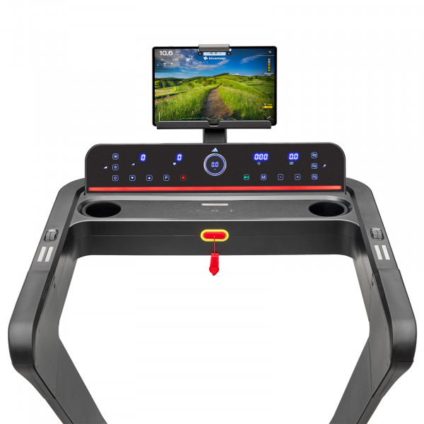 adidas T-700 treadmill with tablet displaying Kinomap