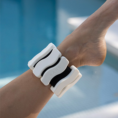Close-up of the BAHE Ankle and Wrist Weight on a model's ankle