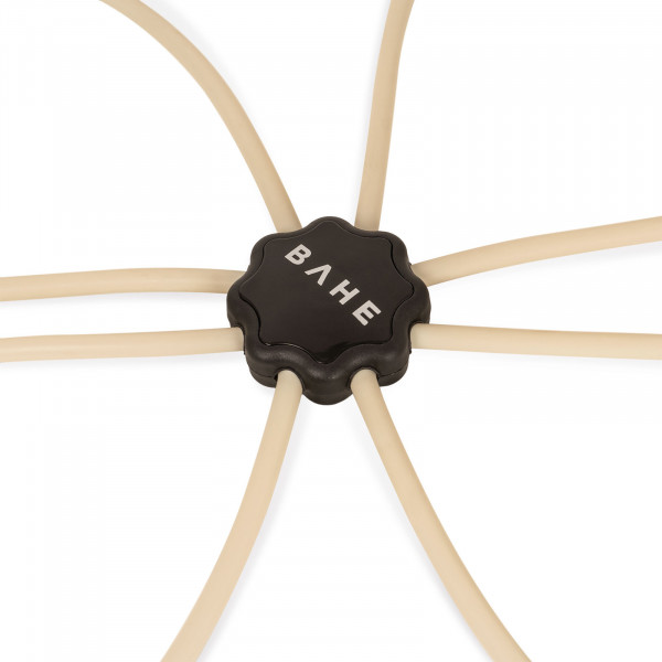 A close-up product image of the BAHE Flow Reformer central adjustment dial.