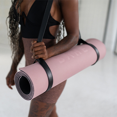 Image of a model carrying the BAHE Soft Touch 5mm Mat