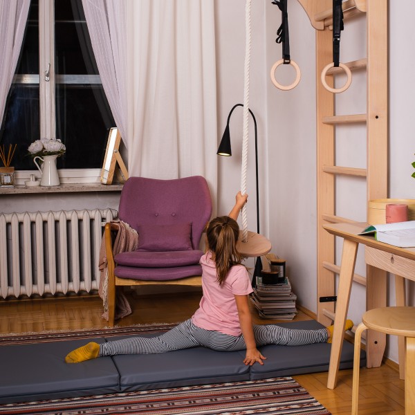 BenchK Mat Grey - girl demonstrating leg split on mat