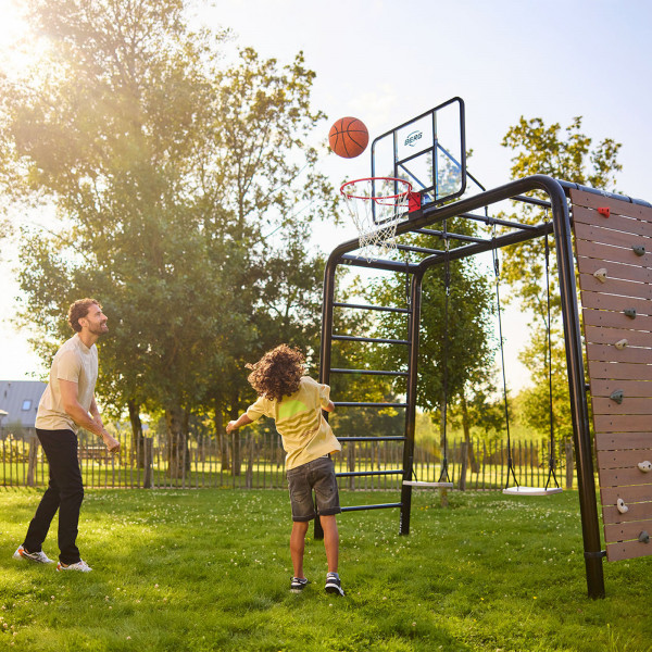 Two people playing basketball on the BERG PlayBase
