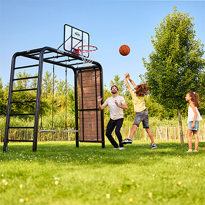 Child shooting a basketball on the BERG PlayBase