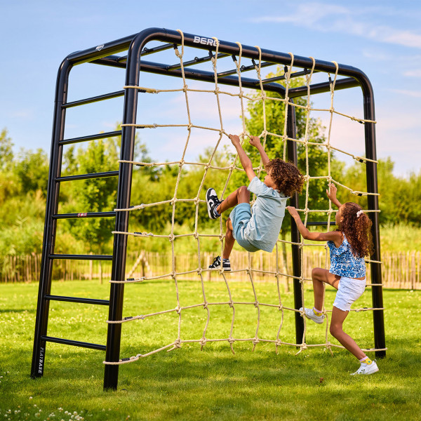 Two kids climbing the BERG PlayBase Climbing Net
