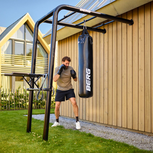 Person training with BERG PlayBase Boxing Bag
