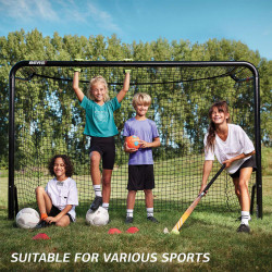 Children playing in front of the BERG SportsGoal Target Net.
