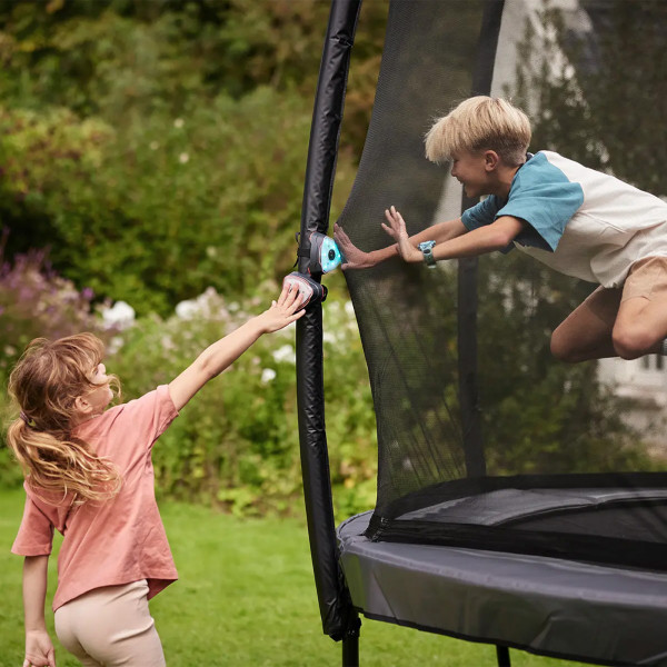 Model using the BERG Infinity Pods Set 6 on a trampoline