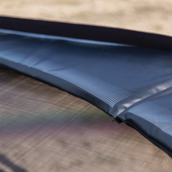 Close-up of the protective padding on the BERG Champion Regular Trampoline with Safety Net Deluxe