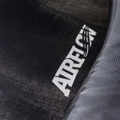 Close-up of the AirFlow jump mat logo on the BERG Sports Favorit Inground Trampoline