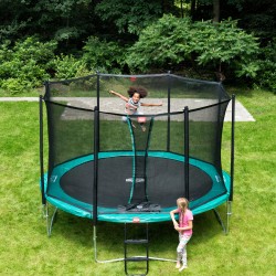 Children enjoying a jump on the BERG Favorit Regular Trampoline With Safety Net Comfort.
