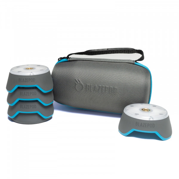 BlazePod kit with three pods stacked on charger and one to the side