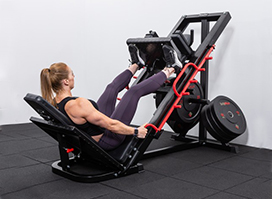 Female model using the CF800 leg press machine in a studio