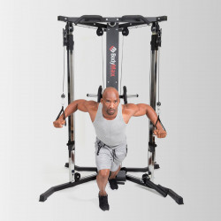 Model performing standing cable fly on the BodyMax Cable Motion Rack System