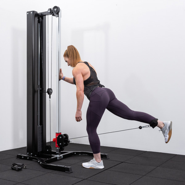User performing a cable kickback on the BodyMax CF810 Elite Adjustable Hi-Low Pulley