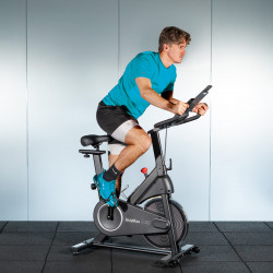 Out of the saddle in BodyMax SC30 indoor bike