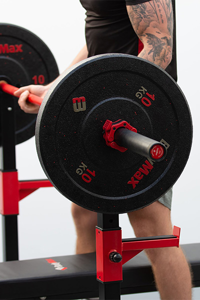 Closeup of a barbell racked on the BodyMax CF310 Home Squat Stands