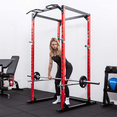 User deadlifting inside the BodyMax CF375 Power Rack