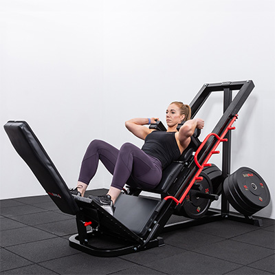 Model performing hack squat on the BodyMax CF800 Leg Press / Hack Squat Machine