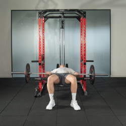 Lifestyle image of a model using the BodyMax Hip Bench Attachment on the BodyMax CF475
