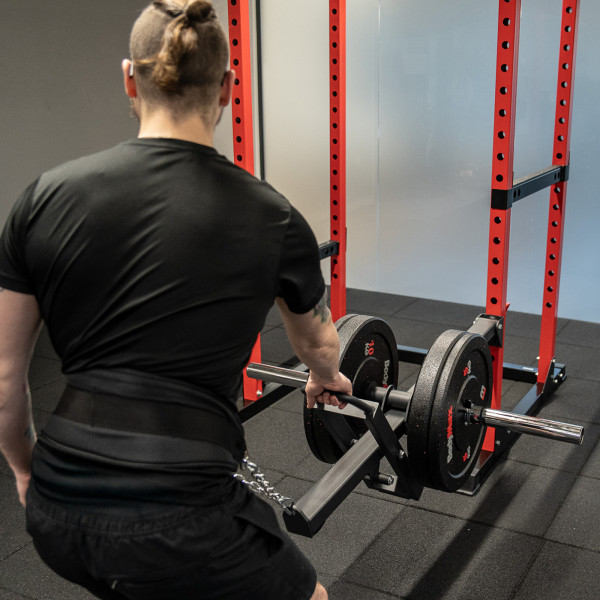 Lifestyle image of a model using the BodyMax Rack Belt Squat from behind.