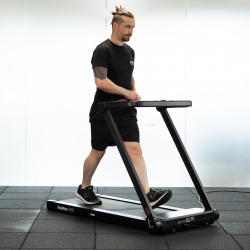 Model walking on the BodyMax TM10 Walking Pad