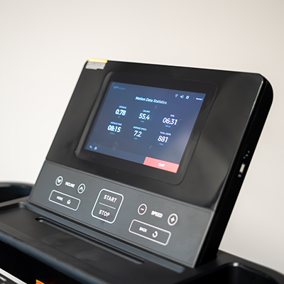 Touchscreen console of the BodyMax TM70 treadmill displaying workout stats