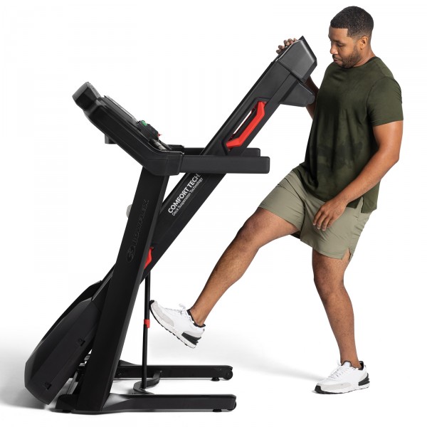 Exerciser folding the BowFlex BXT8Ji Treadmill