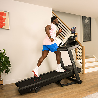 Person running on the BowFlex T6 treadmill on an incline