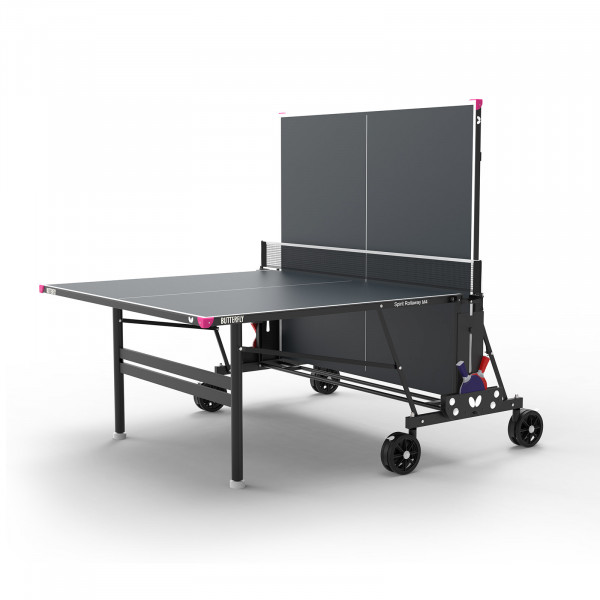The Butterfly Spirit M4 Outdoor Table Tennis Table in grey, partially folded for playback mode.