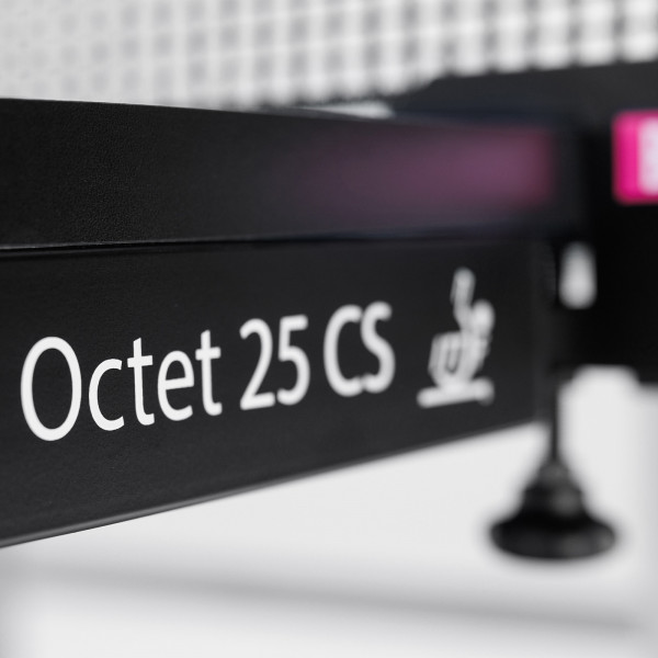 Close-up of the ITTF approval mark on the Butterfly Octet 25 Indoor Rollaway Table Tennis Table in black