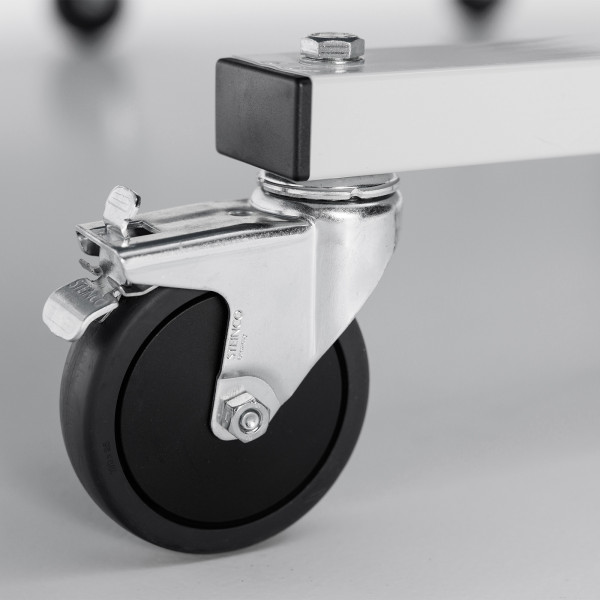 Close-up of the locking castor wheel on the Butterfly Octet 25 Indoor Rollaway Table Tennis Table in black