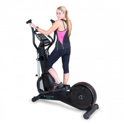 Product image of the cardiostrong EX60 Elliptical - a model is using the machine