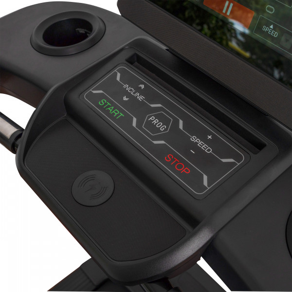 Close-up of the controls and wireless charging pad on the cardiostrong TX80 Treadmill