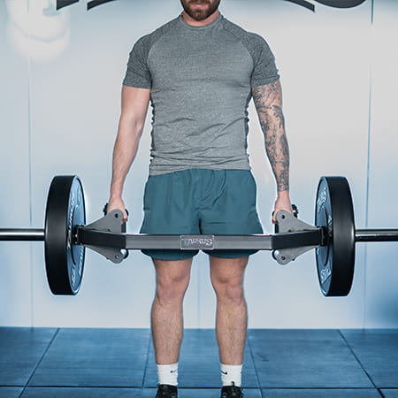 A person uses the Taurus Open Hex Bar for Deadlifting.