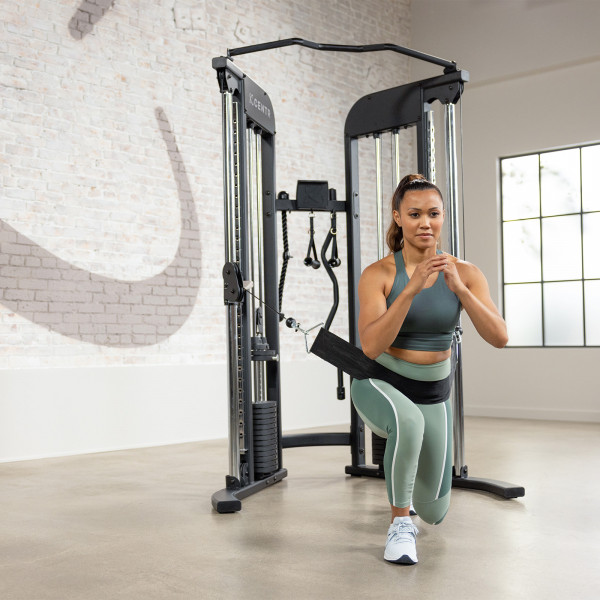 Person performing lunges with the Centr 2 Home Gym Functional Trainer.
