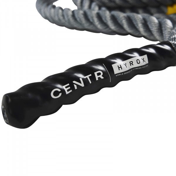 Product image of the CENTR x HYROX Competition Power Rope, the focus is on the handle.