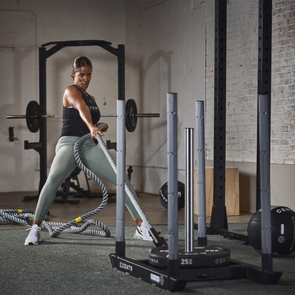 Lifestyle image of the CENTR x HYROX Competition Power Rope, the model is doing a pull exercise.