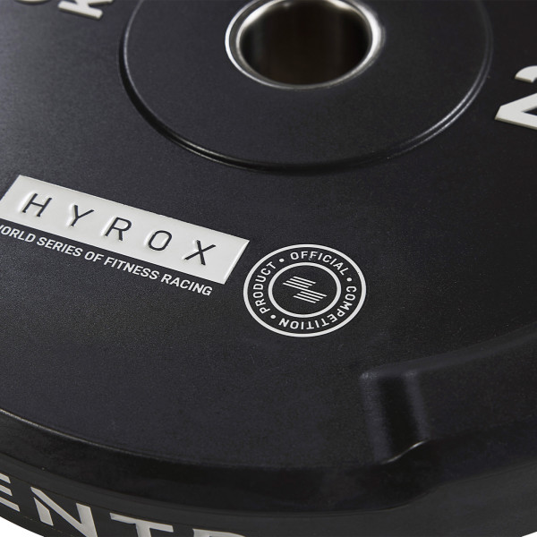 Close-up of CENTR x HYROX Bumper Plate with logo details.