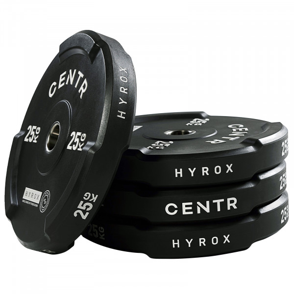 Side view of CENTR x HYROX Bumper Plates stacked together.