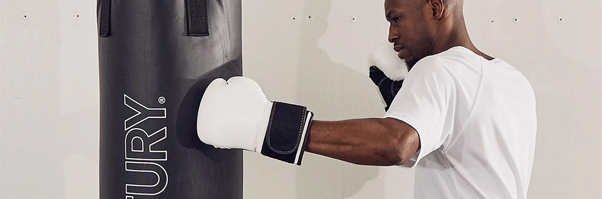 Model punching the Century Traditional Hanging Heavy Bag