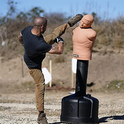 model performing a high kick on the Century BOB showing the flexibility of the neck