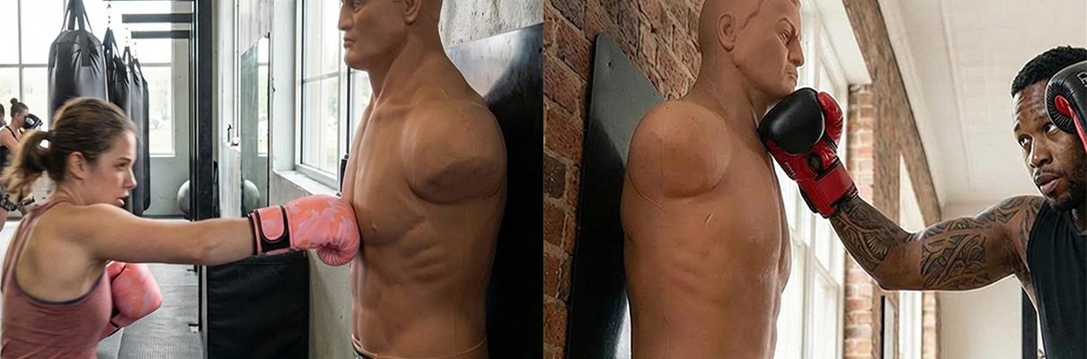 Models training with the Century Wall Mount Boxing BOB