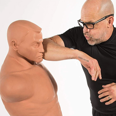 Model performing an elbow strike against the BOB XL