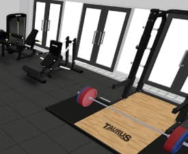 View from the ceiling into a fitness room with equipment and door in the backhground.