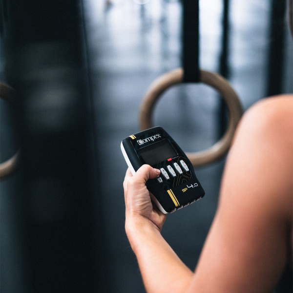 Lifestyle image for the Compex SP 4.0 - Model holding device