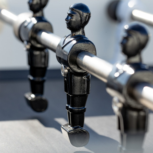 Row of black players on the Cornilleau Play-Style Origin outdoor duo football table in white