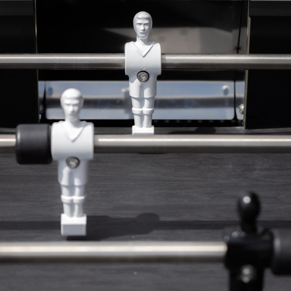 Close-up of white player figure on the Cornilleau Play-Style Origin outdoor duo football table in white