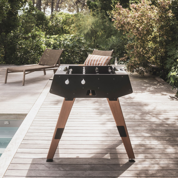 Cornilleau Play-Style Origin outdoor duo football table in black by the pool