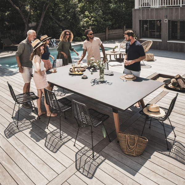Black Cornilleau Play-Style Origin table set for outdoor dining