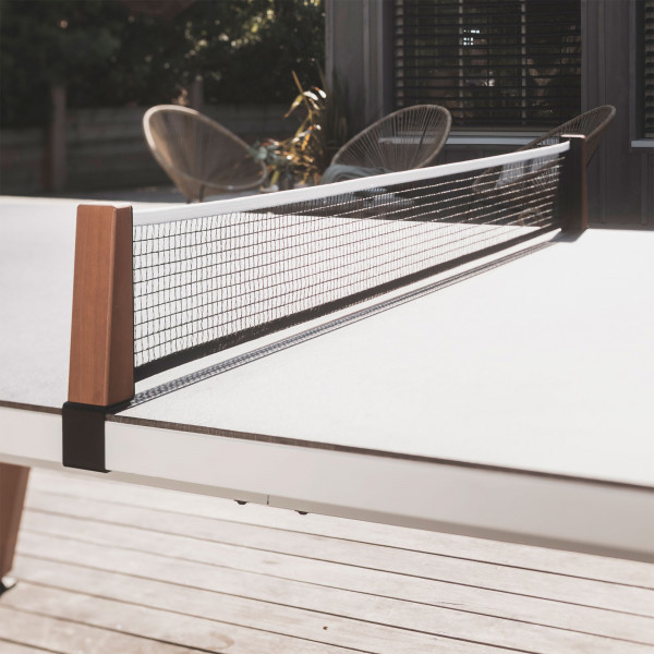 Flexible net on the white Cornilleau Play-Style Origin Outdoor Table Tennis Table